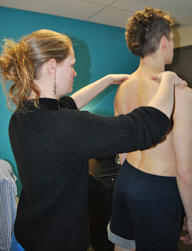 Raphaelle Strub performing an Osteopathic test