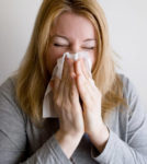 person feeling sick this fall season