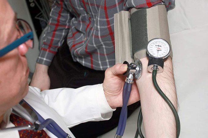 a doctor checking disease in a patient